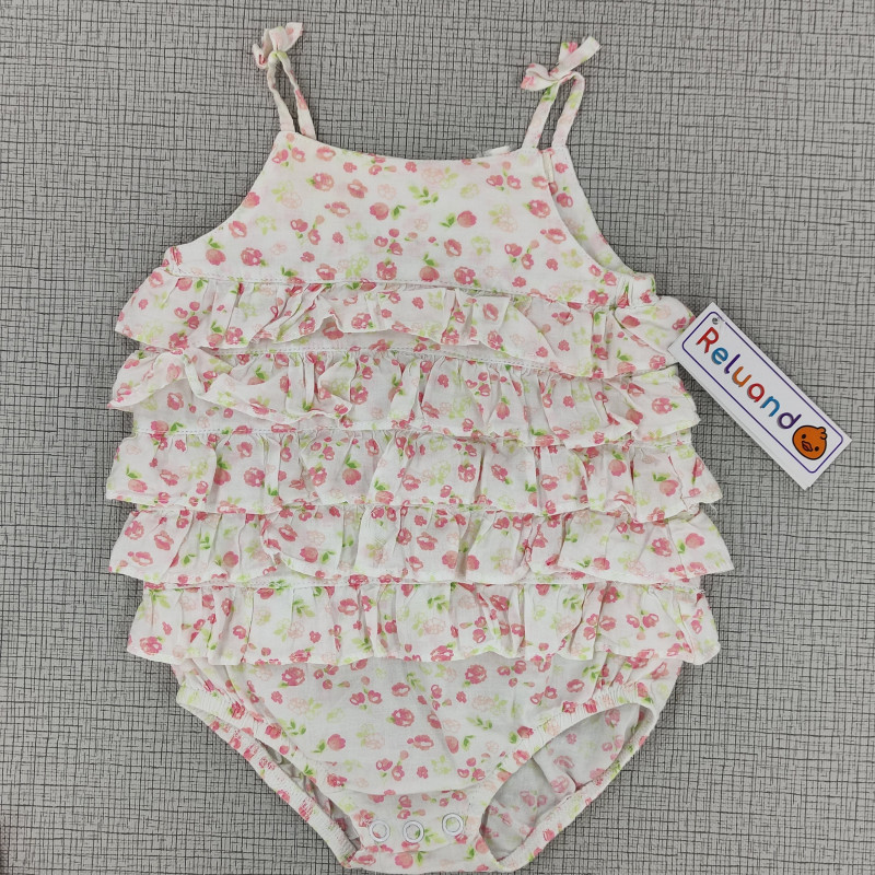 Mameluco blanco con boleros estampados de flores rosado