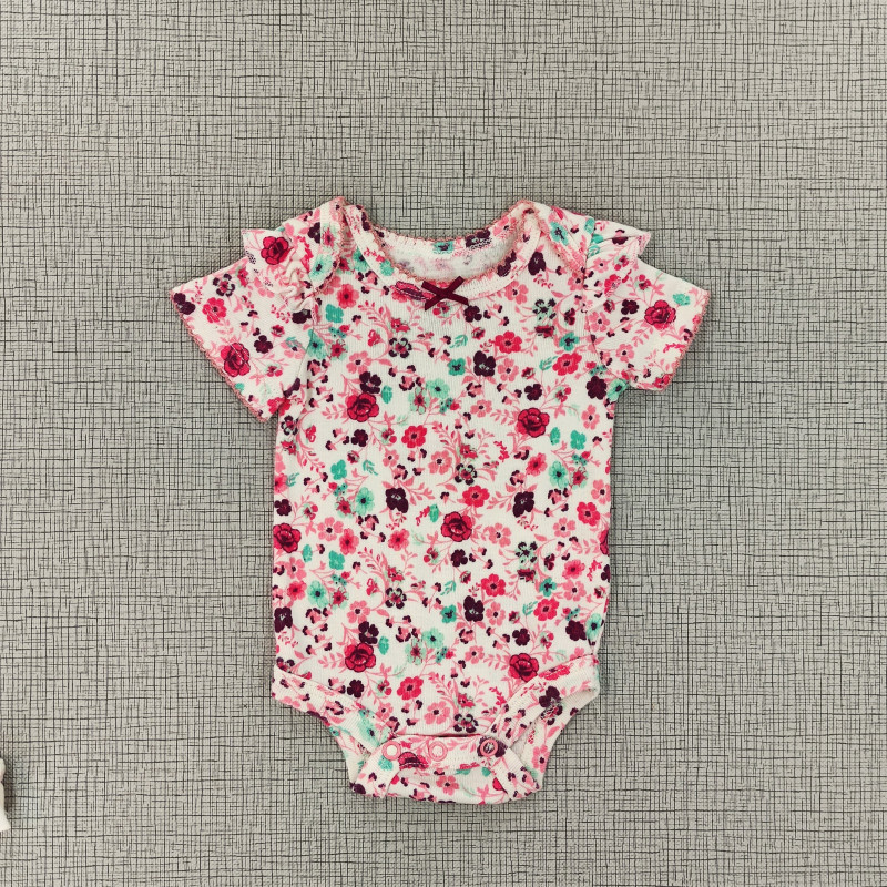 Body blanco con estampado de flores en diferentes tonalidades