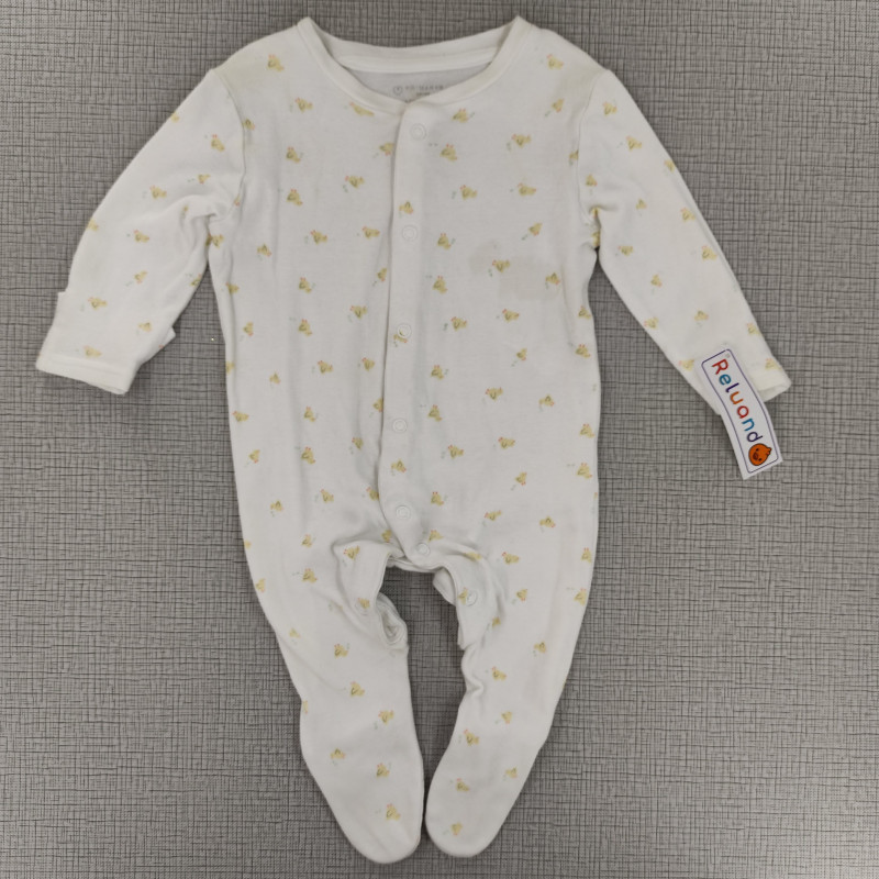 Pijama enteriza blanca con diseño de patitos