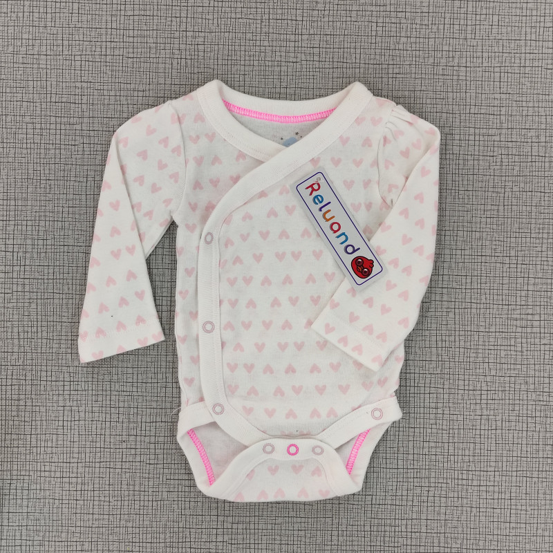 body blanco manga larga con corazones